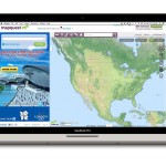 A laptop screen showing a weather map with hurricane tracking details.